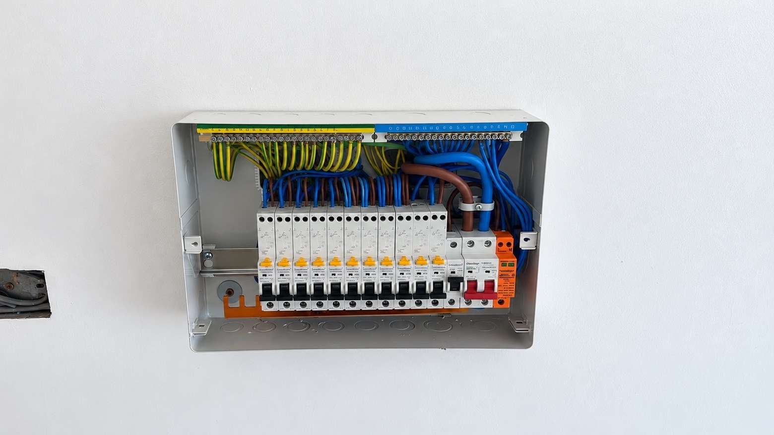 Consumer unit installation with protective devices and wiring