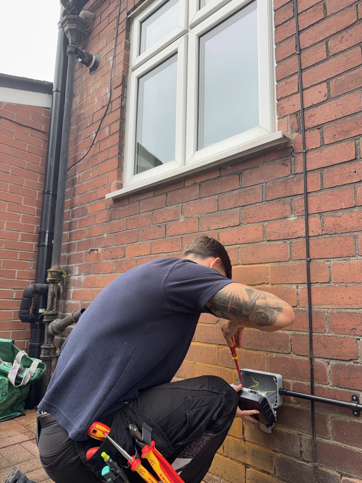 LRM electrician investigating an external electrical fault at a home